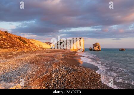 Beautiful afternoon view of the beach around Petra tou Romiou, also known as Aphrodite's birthplace, in Paphos, Cyprus. Stock Photo