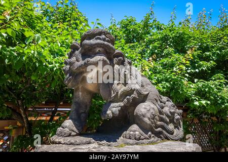 Komainu lion dog statue, Tokyo, Japan Stock Photo