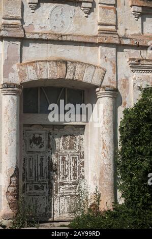 Closeup of an abandoned house with an old entrance door Stock Photo - Alamy