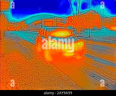 Thermal image of a car with the engine running Stock Photo