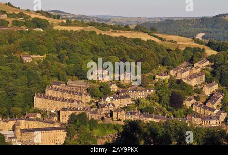 an aerial view of the town of hebden bridge in summer with hillside sloping streets Stock Photo