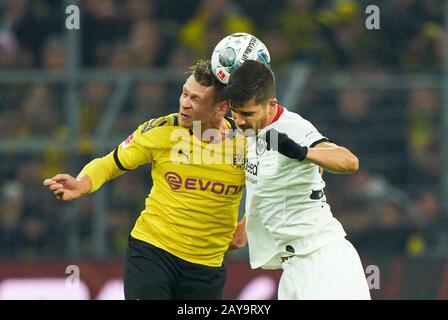 Football Dortmund - Frankfurt, Dortmund Feb 14, 2020. Lukasz PISZCZEK, BVB 26   compete for the ball, tackling, duel, header, zweikampf, action, fight against Andre SILVA, FRA 33  BORUSSIA DORTMUND - EINTRACHT FRANKFURT  - DFL REGULATIONS PROHIBIT ANY USE OF PHOTOGRAPHS as IMAGE SEQUENCES and/or QUASI-VIDEO -  1.German Soccer League , Dortmund, February 14, 2020.  Season 2019/2020, match day 22, BVB,   © Peter Schatz / Alamy Live News Stock Photo