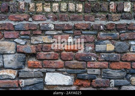 Old rustic stone wall High quality texture and background Stock Photo