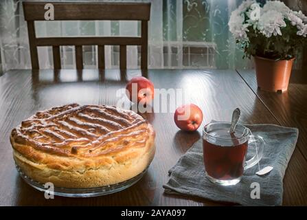 Delicious homemade cake on the dining table. Stock Photo