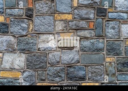 Old rustic stone wall High quality texture and background Stock Photo
