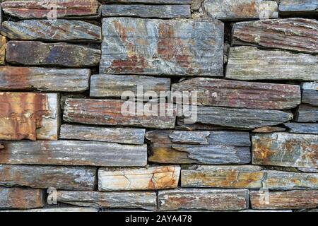 Old rustic stone wall High quality texture and background Stock Photo