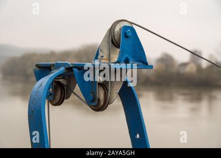Winch with wire rope on pulley - closeup cable Stock Photo