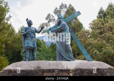 Bogota statue representing Jesus is made to carry the cross on Monserrate mountain Stock Photo