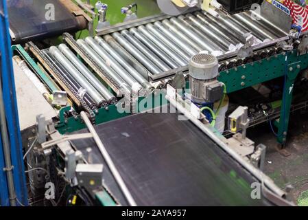 Tenerife, Spain - January 3, 2018 : Conveyor belt in Banana factory packaging line in Tenerife, Canary islands, Spain. Stock Photo