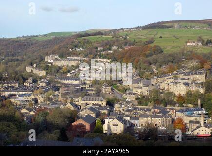 panoramic aerial view of the town of hebden bridge in west yorkshire showing the streets houses and old mill buildings set in th Stock Photo