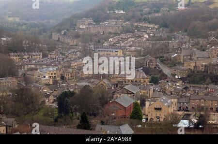 panoramic view of the town of hebden bridge showing the main roads, houses and streets with mill chimneys in winter Stock Photo