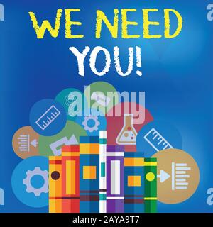Text sign showing We Need You. Conceptual photo asking someone to work together for certain job or target Books Arranged Standin Stock Photo