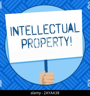 Text sign showing Intellectual Property. Conceptual photo Ownership of an idea or design by the demonstrating Hand Holding Blank Stock Photo