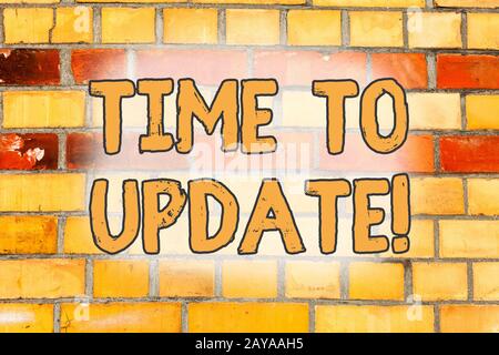Writing note showing Time To Update. Business photo showcasing act updating something someone or updated version program Brick W Stock Photo