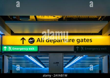 Departure gate sign in airport hall Stock Photo