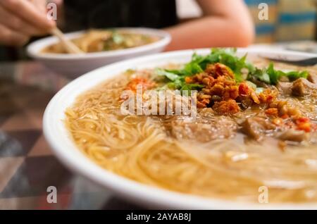 Taiwan snack of thin noodles with pork intestine Stock Photo