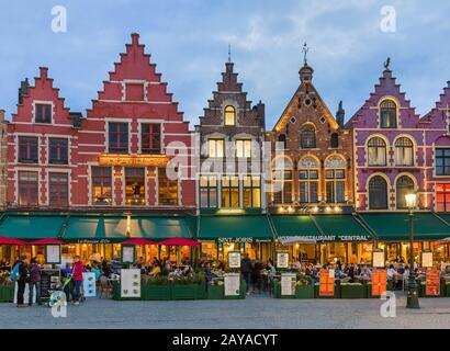 Brugge, Belgium - April 30, 2017: Tourists in cafe at old town Brugge Stock Photo