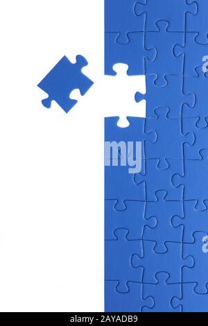 Blue jigsaw puzzle. Business solutions, solving problems,science technology and team building concept. Stock Photo