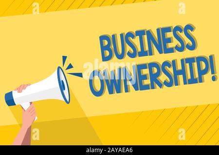 Handwriting text writing Business Ownership. Concept meaning control or to dictate the operations and functions Human Hand Holdi Stock Photo