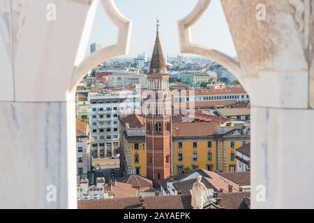 View to tower of San Gottardo from roof of Duomo in Milan Stock Photo