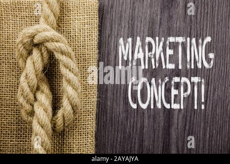 Text sign showing Marketing Concept. Conceptual photo the strategy that firms adopt to satisfy customers. Stock Photo