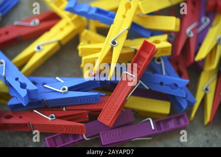 Colorful Plastic Clothespins Scattered Stock Photo