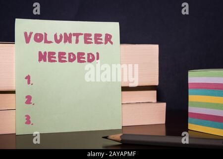 Conceptual hand writing showing Volunteer Needed. Business photo showcasing need work for organization without being paid Close Stock Photo