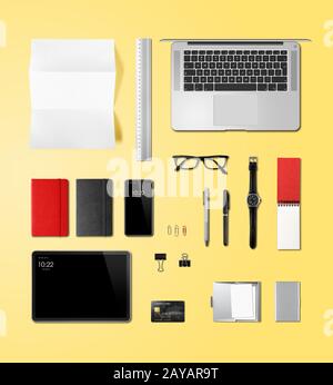 Office desk branding mockup top view isolated on yellow Stock Photo