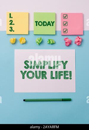 Writing note showing Simplify Your Life. Business photo showcasing focused on important and let someone else worry about less on