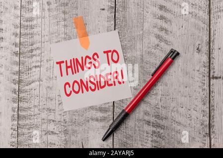 Text sign showing Things To Consider. Conceptual photo think about something carefully in order to make decision One plain blank Stock Photo