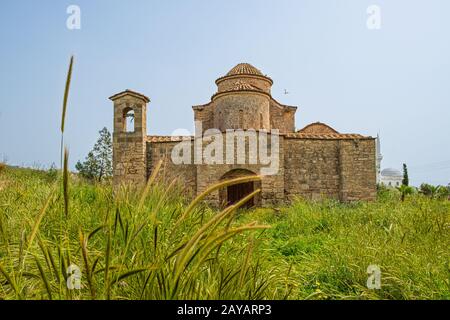 Panayia Kanakaria 6th century Byzantine Monastery Church  behind barley hops Stock Photo