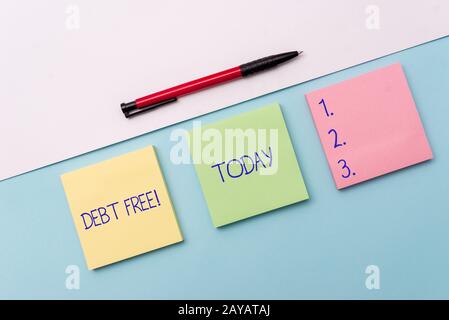 Conceptual hand writing showing Debt Free. Business photo showcasing does not owning any money or things to any individual or co Stock Photo