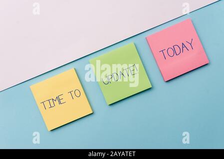 Text sign showing Time To Update. Conceptual photo this is right moment to make something more modern new Pastel colour note pap Stock Photo