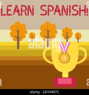 Conceptual hand writing showing Learn Spanish. Business photo text gain or acquire knowledge of speaking and writing Spanish Tro Stock Photo