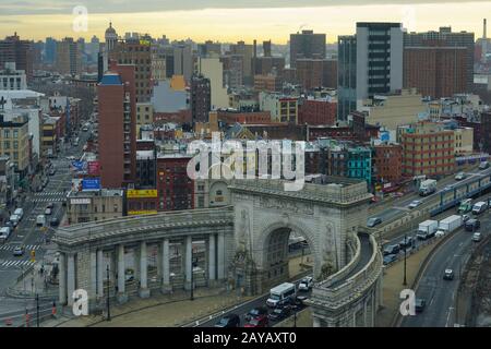 NEW YORK CITY, NY -1 FEB 2020- View of the Greek revival triumphal arch and colonnade at the entrance of the Manhattan Bridge over the East River in N Stock Photo