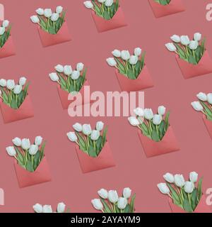 Flowers greeting envelopes pattern on a pastel background. Stock Photo