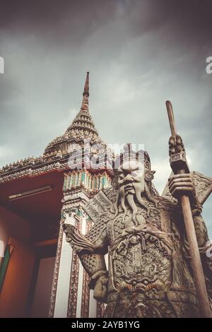 Chinese Guard statue in Wat Pho, Bangkok, Thailand Stock Photo