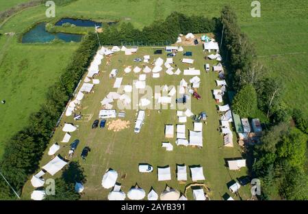 Aerial view of a tent camp and market stalls at a medieval spectacle ...
