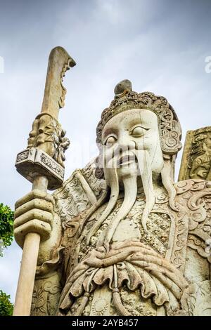 Chinese Guard statue in Wat Pho, Bangkok, Thailand Stock Photo