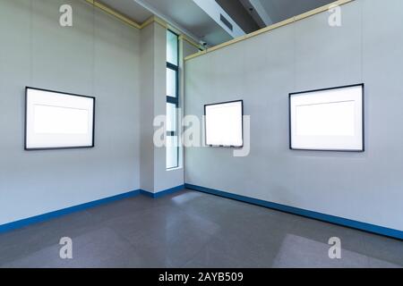 blank frames on exhibition room Stock Photo