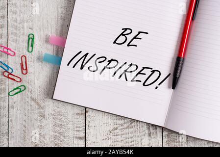 Conceptual hand writing showing Be Inspired. Business photo text fill someone with urge or ability to do or feel something Noteb Stock Photo