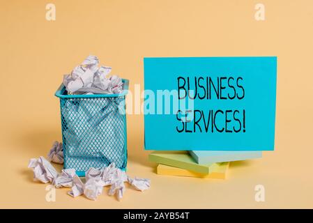 Writing note showing Business Services. Business photo showcasing Provides intangible products Bookkeeping IT Accounting crumple Stock Photo
