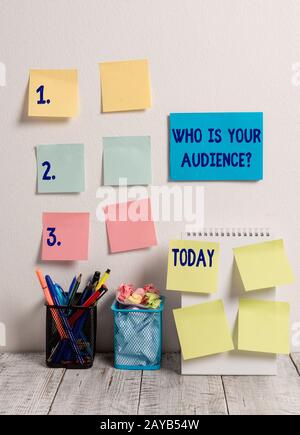 Handwriting text writing Who Is Your Audience Question. Concept meaning who is watching or listening to it 10 Sticky Notes Card Stock Photo