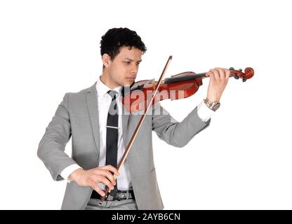Close up of young man playing the violin Stock Photo