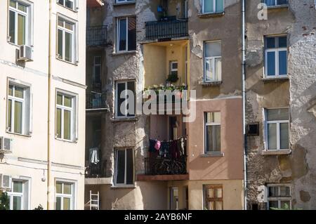 Old grunge neglected city buildings backside view Stock Photo