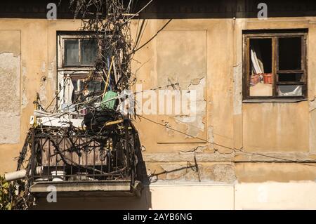 Old grunge neglected city buildings backside view Stock Photo