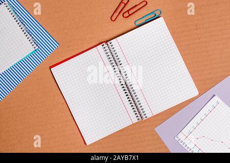 Notebook Paper on Cardboard Background Stock Illustration