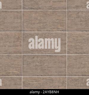 A fragment of wall covered with ceramic tiles Stock Photo