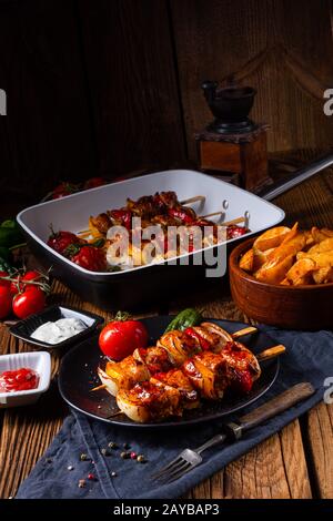 marinated kebab skewers with meat and vegetables Stock Photo