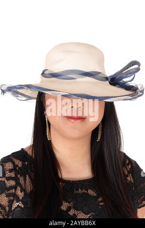 A close up portrait of a Chinese woman with a summer hat Stock Photo